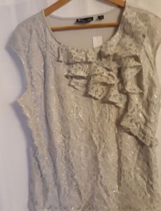 New with tags on, sleeveless silver top